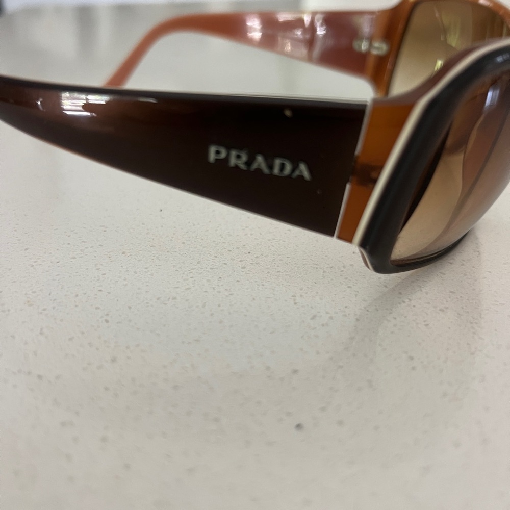 Prada Gradient Brown Sunglasses with black case. - Picture 2 of 3